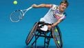 Netherlands' Niels Vink serves against Netherlands' Sam Schroder during the men's quad wheelchair singles final on day thirteen of the Australian Open tennis tournament in Melbourne on January 28, 2023. 
DAVID GRAY / AFP