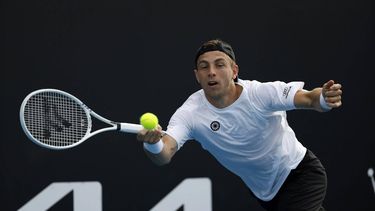 epa11086639 Tallon Griekspoor of the Netherlands in action against Arthur Fils of France during their Men's second round match at the Australian Open tennis tournament in Melbourne, Australia, 18 January 2024.  EPA/MAST IRHAM