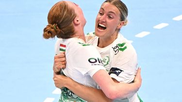 Gyori's Dutch right back Dione Housheer (L) and Gyori's Dutch left back Kelly Dulfer  celebrate after winning the EHF Women's Handball Champions League semi-final match between Brest Bretagne Handball and Gyori Audi ETO KC in Budapest on June 6, 2026. 
Attila KISBENEDEK / AFP