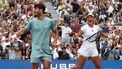 Britain's Emma Raducanu and Carlos Alcaraz of Spain celebrate a point during their first round mixed doubles match against Jessica Pegula of the US and Jack Draper of Britain at the US Open tennis tournament at the USTA Billie Jean King National Tennis Center in New York City on August 19, 2025. 
TIMOTHY A. CLARY / AFP