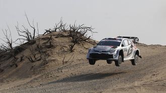 French driver Sebastien Ogier and his French co-driver Vincent Landais compete in their Toyota GR Yaris during stage 5 of the FIA World Rally Championship (WRC) in Jeddah on November 27, 2025. 
Fayez Nureldine / AFP