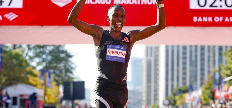 Kenyan runner Amos Kipruto crosses the finish line to win first place in the men's professional division during the 2026 Chicago Marathon in Chicago, Illinois on October 11, 2026.  
KAMIL KRZACZYNSKI / AFP