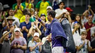 France’s Gael Monfils waves as he leaves the court after being defeated by Russia’s Roman Safiullin during their men's singles first round tennis match on day three of the US Open tennis tournament at the USTA Billie Jean King National Tennis Center in New York City, on August 26, 2025. 
Kena Betancur / AFP