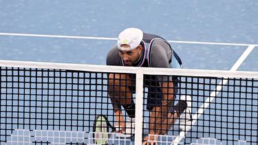 Nick Kyrgios of Australia plays a point during his men's doubles match against Michael Venus of New Zealand and Nikola Mektic of Croatia at the Brisbane International tennis tournament in Brisbane on January 1, 2025. 
William WEST / AFP