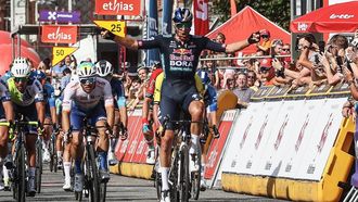 Belgium's Jordi Meeus (R) of Red Bull-Bora-Hansgrohe celebrates as he crosses the finish line to win stage 1 of the Tour De Wallonie cycling race from Tournai to Fleurus (178,6 km) in Fleurus on July 22, 2024. 
BRUNO FAHY / Belga / AFP