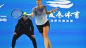 2023-10-13 06:29:36 Ukraine's Anhelina Kalinina hits a return to China's Zheng Qinwen during their women’s singles quarter-final match of the WTA Zhengzhou Open tennis tournament in Zhengzhou, in China's central Henan province on October 13, 2023. 
STR / AFP