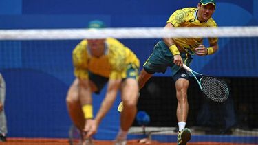 Australia's Matthew Ebden serves, playing with Australia's John Peers against US' Austin Krajicek and US' Rajeev Ram during their men's doubles final tennis match on Court Philippe-Chatrier at the Roland-Garros Stadium during the Paris 2024 Olympic Games, in Paris on August 3, 2024.  
Miguel MEDINA / AFP