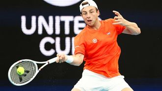 Netherlands' Tallon Griekspoor hits a return to Poland's Hubert Hurkacz during their men's singles match at the United Cup tennis tournament in Sydney on January 7, 2026. 
Izhar KHAN / AFP