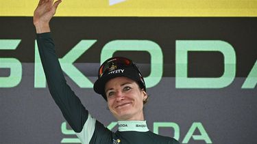 Team Visma | Lease a Bike's Dutch rider Marianne Vos celebrates on the podium with the best sprinter's green jersey after the 7th stage (out of 8) of the third edition of the Women's Tour de France cycling race, a 166.4 km between Champagnole and Le Grand-Bornand, on August 17, 2024.  
JULIEN DE ROSA / AFP