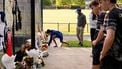 People lay flowers at the cricket nets in memory of promising 17-year-old Australian cricketer Ben Austin, who died in Melbourne on 30 October 2025, after being struck by a ball two days earlier. Austin was in the nets with a helmet on before a Twenty20 game in Melbourne on October 28 when he was hit in the neck while facing a ball-throwing device.
William WEST / AFP