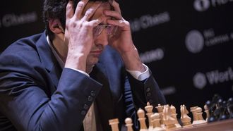 epa06632806 Russian player Vladimir Kramnik contemplates a move during a game of chess with Azerbaijani player Shakhriyar Mamedyarov (unseen), during the 14th round of the FIDE Candidates tournament in Berlin, Germany 27 March 2018.  The Candidates Tournament is an eight-player double round-robin (or all-play-all) chess competition, organized jointly by the World Chess Federation. The winner of the tournament can challenge World Chess Champion Magnus Carlsen from Norway.  EPA/OMER MESSINGER