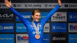 Third-placed Italy's Elisa Longo Borghini celebrates during the podium ceremony of the women's Elite Road Race cycling event as part of the UCI 2024 Road World Championships, in Zurich, on September 28, 2024. 
Fabrice COFFRINI / AFP
