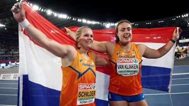 Netherlands' athlete Jessica Schilder (L), first place, and Netherlands' athlete Jorinde Van Klinken, second place, celebrate after the women's shot put final during the European Athletics Championships at the Olympic stadium in Rome on June 7, 2024. 
Anne-Christine POUJOULAT / AFP
