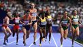 Netherlands' Myrte van der Schoot leads in the women's 4x400m relay heat of the athletics event at the Paris 2024 Olympic Games at Stade de France in Saint-Denis, north of Paris, on August 9, 2024. 
Jewel SAMAD / AFP