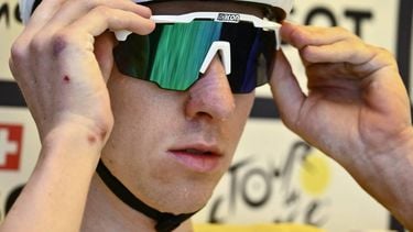 UAE Team Emirates - XRG team's Slovenian rider Tadej Pogacar wearing the overall leader's yellow jersey awaits the start of the 13th stage of the 112th edition of the Tour de France cycling race, 10.9 km individual time trial between Loudenvielle and Peyragudes, in the Pyrenees mountains of southwestern France, on July 18, 2025. 
Marco BERTORELLO / AFP