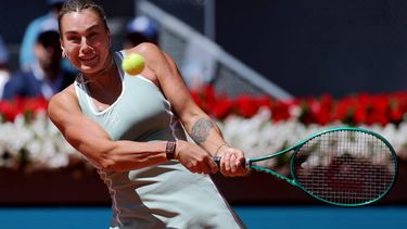 Belarus’ Aryna Sabalenka returns the ball to  Japan’s Naomi Osaka during their 2026 WTA Tour Madrid Open tennis tournament women's singles match at the Caja Magica in Madrid, on April 27, 2026.  
Thomas COEX / AFP