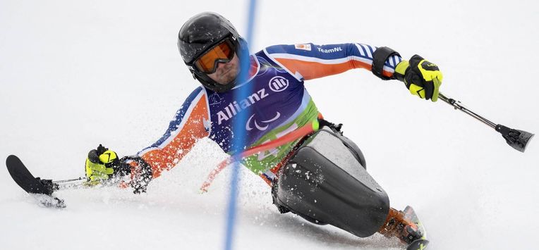 epa12809371 Netherlands' Jeroen Kampschreur in action during the Slalom run in the Men's Alpine Combined of the Para Alpine Skiing at Milano Cortina 2026 Paralympic Winter Games in Cortina d'Ampezzo, Italy, 10 March 2026.  EPA/CLAUDIO THOMA