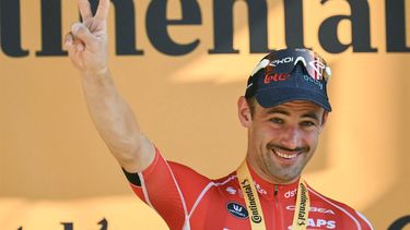 Lotto Dstny team's Belgian rider Victor Campenaerts celebrates on the podium after winning the 18th stage of the 111th edition of the Tour de France cycling race, 179,5 km between Gap and Barcelonnette, in southeastern France, on July 18, 2024. 
Marco BERTORELLO / AFP