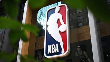 The NBA logo is seen outside an NBA fan store in New York on July 8, 2024. 
ANGELA WEISS / AFP