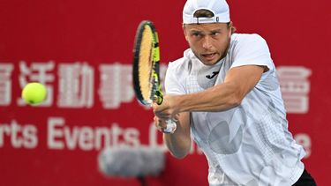France's Alexandre Muller hits a return to Japan's Kei Nishikori during their men's singles final match at the Hong Kong Open tennis tournament in Hong Kong on January 5, 2025. 
Peter PARKS / AFP