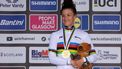 2023-08-10 17:44:28 US rider Chloe Dygert celebrates with her gold medal after winning the women's Individual Time Trial in Stirling during the UCI Cycling World Championships in Scotland on August 10, 2023. Australia's Grace Brown (L) won silver and Austria's Christina Schweinberger won bronze. 
Adrian DENNIS / AFP