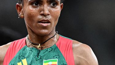Ethiopia's Gudaf Tsegay reacts after competing in the women's 5000m heats during the World Athletics Championships in Tokyo on September 18, 2025. 
Jewel SAMAD / AFP