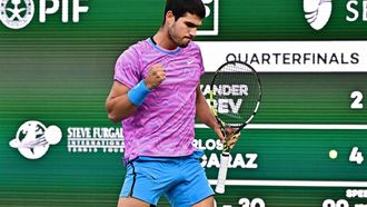 Spain's Carlos Alcaraz celebrates a point won against Germany's Alexander Zverev in the ATP-WTA Indian Wells Masters men's quarter final tennis match at the Indian Wells Tennis Garden in Indian Wells, California, on March 14, 2024. 
Frederic J. BROWN / AFP