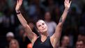epa12615890 Aryna Sabalenka acknowledges the crowd after losing the 'Battle of the Sexes' exhibition match against Nick Kyrgios of Australia in Dubai, United Arab Emirates, 28 December 2025.  EPA/Christopher Pike / POOL