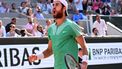 2023-06-06 18:27:24 epa10676296 Karen Khachanov of Russia reacts as he plays Novak Djokovic of Serbia in their Men's quarterfinal match during the French Open Grand Slam tennis tournament at Roland Garros in Paris, France, 06 June 2023.  EPA/CAROLINE BLUMBERG