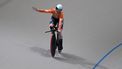 Netherlands' #122 Hetty Van de Wouw celebrates after setting a new world record and winning the women's 1km time trial event final at the 2025 UCI Track World Championships, in the Penalolen Velodrome in Santiago, on October 25, 2025. 
Rodrigo ARANGUA / AFP
