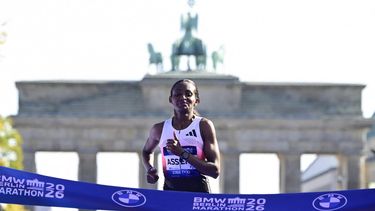 Ethiopia's Tigst Assefa crosses the finish line to win the women's race of 52nd Berlin Marathon in Berlin, Germany on September 27, 2026. Ethiopian runner Tigst Assefa narrowly missed out on breaking the women's world record at the Berlin Marathon on Sunday, crossing the finish line with an injury after being on record pace throughout.
John MACDOUGALL / AFP