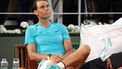 epa11373927 Rafael Nadal of Spain reacts after losing his Men's Singles 1st round match against Alexander Zverev of Germany during the French Open Grand Slam tennis tournament at Roland Garros in Paris, France, 27 May 2024.  EPA/TERESA SUAREZ