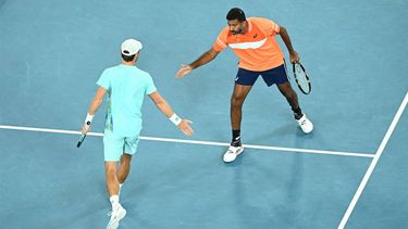 epa11108003 Matthew Ebden (left) of Australia and Rohan Bopanna (right) of India react during their Men’s Doubles final against Simone Bolelli and Andrea Vavassori of Italy on Day 14 of the Australian Open tennis tournament in Melbourne, Australia, 27 January 2024.  EPA/JAMES ROSS  AUSTRALIA AND NEW ZEALAND OUT