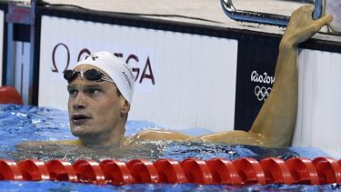 France's Yannick Agnel reacts after the Men's 200m Freestyle heats during the swimming event at the Rio 2016 Olympic Games at the Olympic Aquatics Stadium in Rio de Janeiro on August 7, 2016.   
GABRIEL BOUYS / AFP