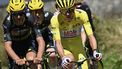 UAE Team Emirates - XRG team's Slovenian rider Tadej Pogacar wearing the overall leader's yellow jersey (R) and Team Visma - Lease a bike team's Belgian rider Tiesj Benoot (L) cycle during the 6th stage of the 112th edition of the Tour de France cycling race, 201.5 km between Bayeux and Vire Normandie, Northwestern France, on July 10, 2025. 
Loic VENANCE / AFP
