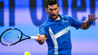 Serbia's Novak Djokovic hits a return to Italy's Matteo Berettini during their men's singles match at the ATP Qatar Open tennis tournament in Doha on February 18, 2025. 
Mahmud HAMS / AFP