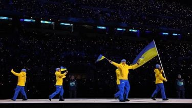 Flagbearer Yelyzaveta Sydorko of Team Ukraine leads the team in the athletes' parade during the opening ceremony of the Milano Cortina 2026 Winter Olympics at San Siro Stadium on February 06, 2026 in Milan, Italy. 
Sarah Stier / POOL / AFP