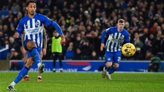 Brighton's Brazilian striker #09 Joao Pedro shoots a penalty kick and scores his team fourth goal during the English Premier League football match between Brighton and Hove Albion and Tottenham Hotspur at the American Express Community Stadium in Brighton, southern England on December 28, 2023. 
Glyn KIRK / AFP