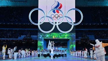 The delegation from Russia takes part in the parade of athletes, underneath the Olympics rings, during the opening ceremony of the Beijing 2022 Winter Olympic Games, at the National Stadium, known as the Bird's Nest, in Beijing, on February 4, 2022.  
Ben STANSALL / AFP