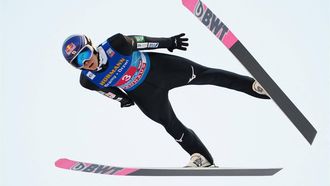 Japan's Ryoyu Kobayashi soars through the air during the competition of the third stage of the Four-Hills tournament (Vierschanzentournee) that is part of the FIS Ski Jumping World Cup, in Innsbruck, Austria, on January 3, 2024. 
GEORG HOCHMUTH / APA / AFP