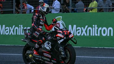 Aprilia Racing's Italian rider Marco Bezzecchi celebrates his victory after crossing the finish line during the MotoGP Thailand Grand Prix at the Buriram International Circuit in Buriram on March 1, 2026. 
Lillian SUWANRUMPHA / AFP