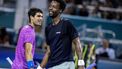 epa11243773 Carlos Alcaraz of Spain (L) speaks with Gael Monfils of France during the men's third round match of the 2024 Miami Open tennis tournament in Miami, Florida, USA, 25 March 2024.  EPA/CRISTOBAL HERRERA-ULASHKEVICH