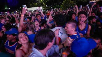 Knicks fans celebrate in Central Park after the New York Knicks defeated the San Antonio Spurs in Game 5 of the NBA Finals to win the series, in New York, on June 13, 2026. The Knicks won the NBA Championship for the first time since 1973, for the third time in franchise history.
kena betancur / AFP