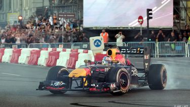 Mexican Formula 1 pilot Sergio Perez drives his F1 through the streets of the center of Madrid during an exhibition on July 15, 2023. 
Thomas COEX / AFP