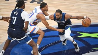 epa12133141 Minnesota Timberwolves guard Mike Conley (R) tries to get past Oklahoma City Thunder guard Aaron Wiggins (C) as Minnesota Timberwolves center Naz Reid (L) sets a pick during the first half of game three of the NBA Western Conference finals between the Oklahoma City Thunder and the Minnesota Timberwolves at the Target Center in Minneapolis, Minnesota, USA, 24 May 2025.  EPA/CRAIG LASSIG  SHUTTERSTOCK OUT