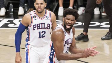 2023-04-20 21:59:24 epa10583137 The 76ers' Joel Embiid (R) and Tobias Harris (L) celebrate as their team wins game three of the first round playoff series between the Philadelphia 76ers and the Brooklyn Nets at the Barclays Center in the Brooklyn borough of New York, New York, USA, 20 April 2023.  EPA/JUSTIN LANE SHUTTERSTOCK OUT