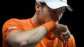 Netherlands' Botic Van de Zandschulp wipes his face as he plays against Italy's Matteo Arnaldi during the third men's single quarter-final tennis match between Italy and Netherlands of the Davis Cup tennis tournament at the Martin Carpena sportshall, in Malaga on November 23, 2023. 
JORGE GUERRERO / AFP