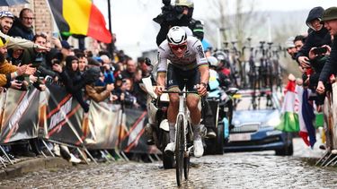Dutch Mathieu van der Poel of Alpecin-Deceuninck competes in the Oude Kwaremont during the men's race of the 'Ronde van Vlaanderen' (Tour des Flandres) one day cycling race, 270,8 km from Antwerp to Oudenaarde, on March 31, 2024. 
DAVID PINTENS / Belga / AFP
