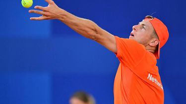 Netherlands' Tallon Griekspoor serves to Spain's Carlos Alcaraz during their men's singles second round tennis match on Court Philippe-Chatrier at the Roland-Garros Stadium at the Paris 2024 Olympic Games, in Paris on July 29, 2024.  
Martin  BERNETTI / AFP