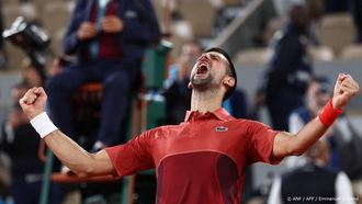 Serbia's Novak Djokovic celebrates after winning against Italy's Lorenzo Musetti at the end of their men's singles match on Court Philippe-Chatrier on day seven of the French Open tennis tournament at the Roland Garros Complex in Paris on June 2, 2024. 
EMMANUEL DUNAND / AFP